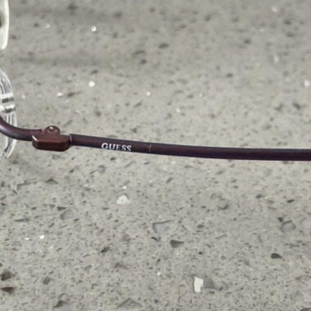 GUESS Men's Rimless Eyeglasses — Brown Temples, Gold Bridge - Picture 4 of 5